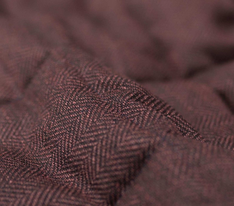 merino wool farmed in a sustainable way. the sheep are treated well and the production is sustainable. the material is really soft to your skin and regulates the temperature